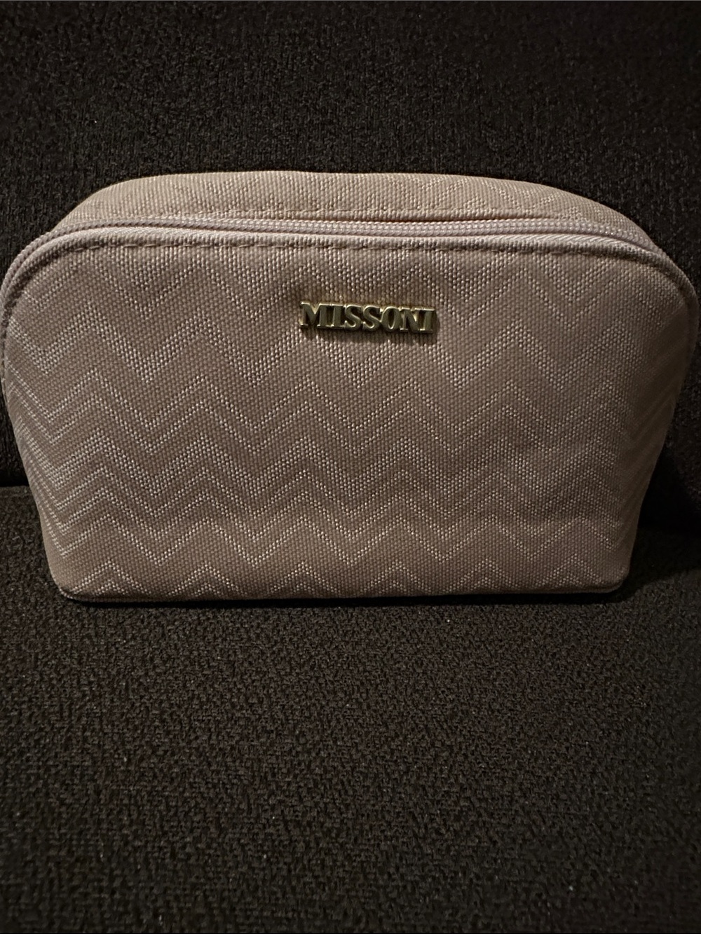 Missoni x Delta Pink Chevron Toiletry Pouch with Gold Logo. 4.5” L x 9”W.